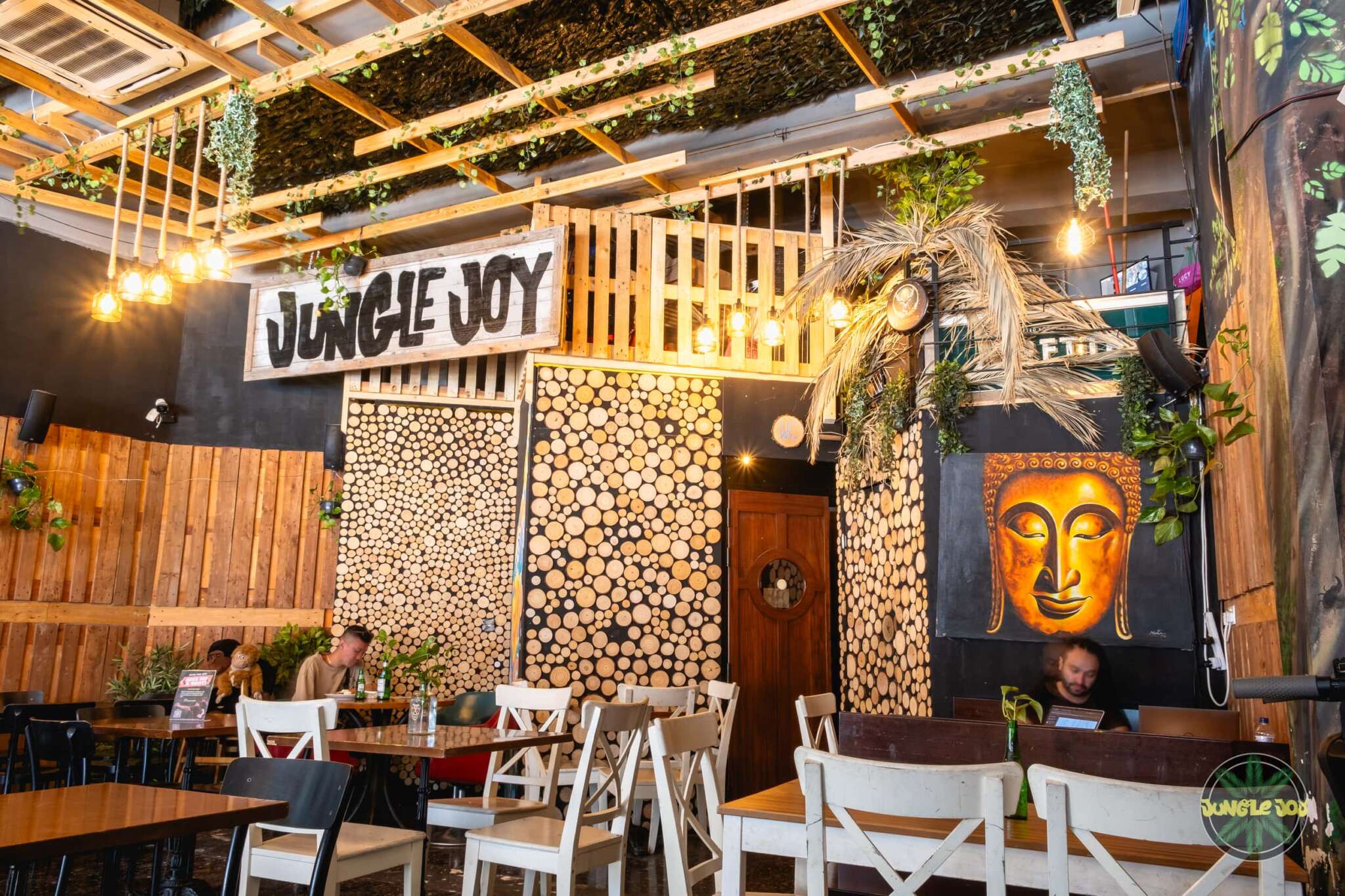 Jungle Joy bar with the COOKER mural